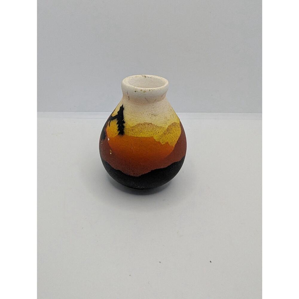 Native American Navajo pottery bud vase, likely created by an artist